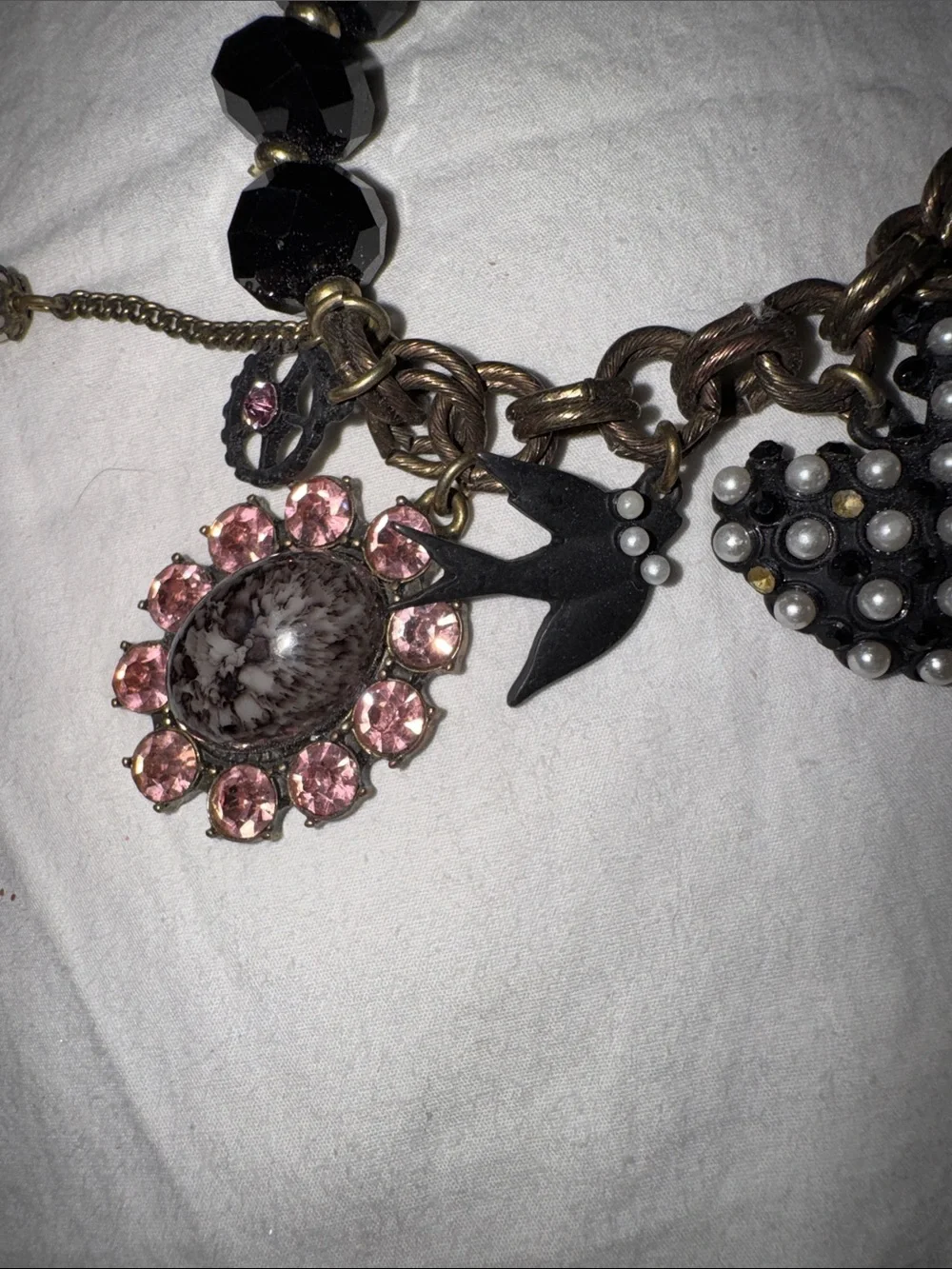 This piece is a RARE vintage Betsey Johnson Y2K COMPLETE Charm Bracelet.